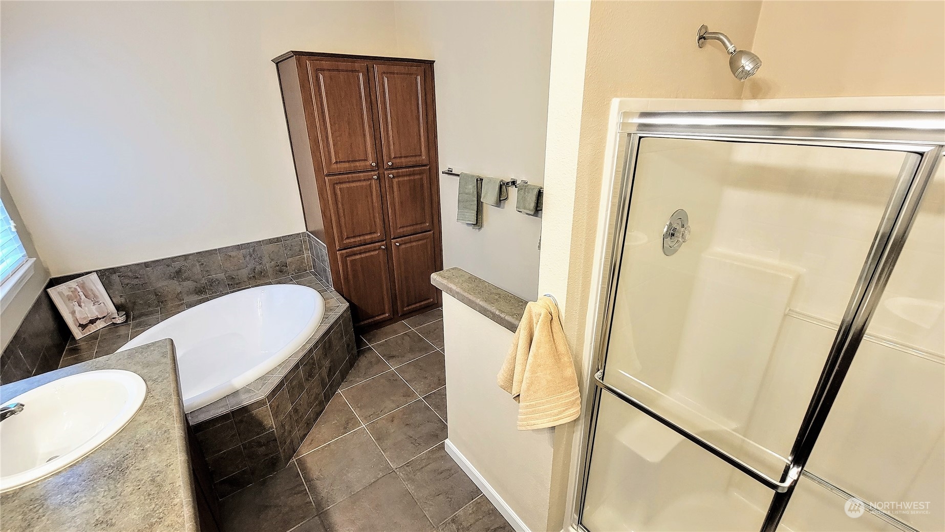 107 South Pass Road, Unit 24 Nooksack, WA 98276 - Photo 17 of 40 a bathroom with a granite countertop sink toilet and shower