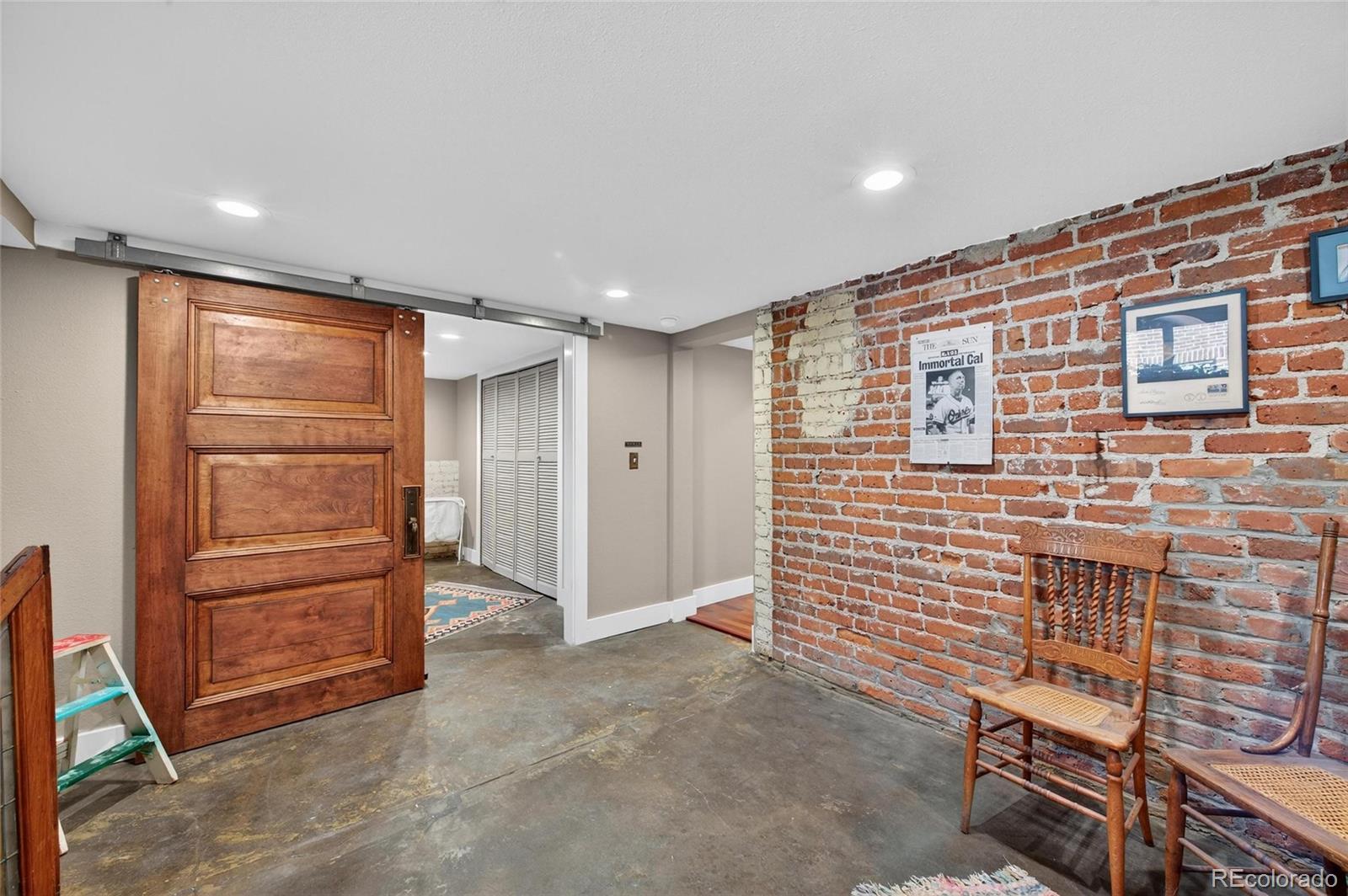 607 Madison Street Denver, CO 80206 - Photo 26 of 31 a view of livingroom with the walk in closet
