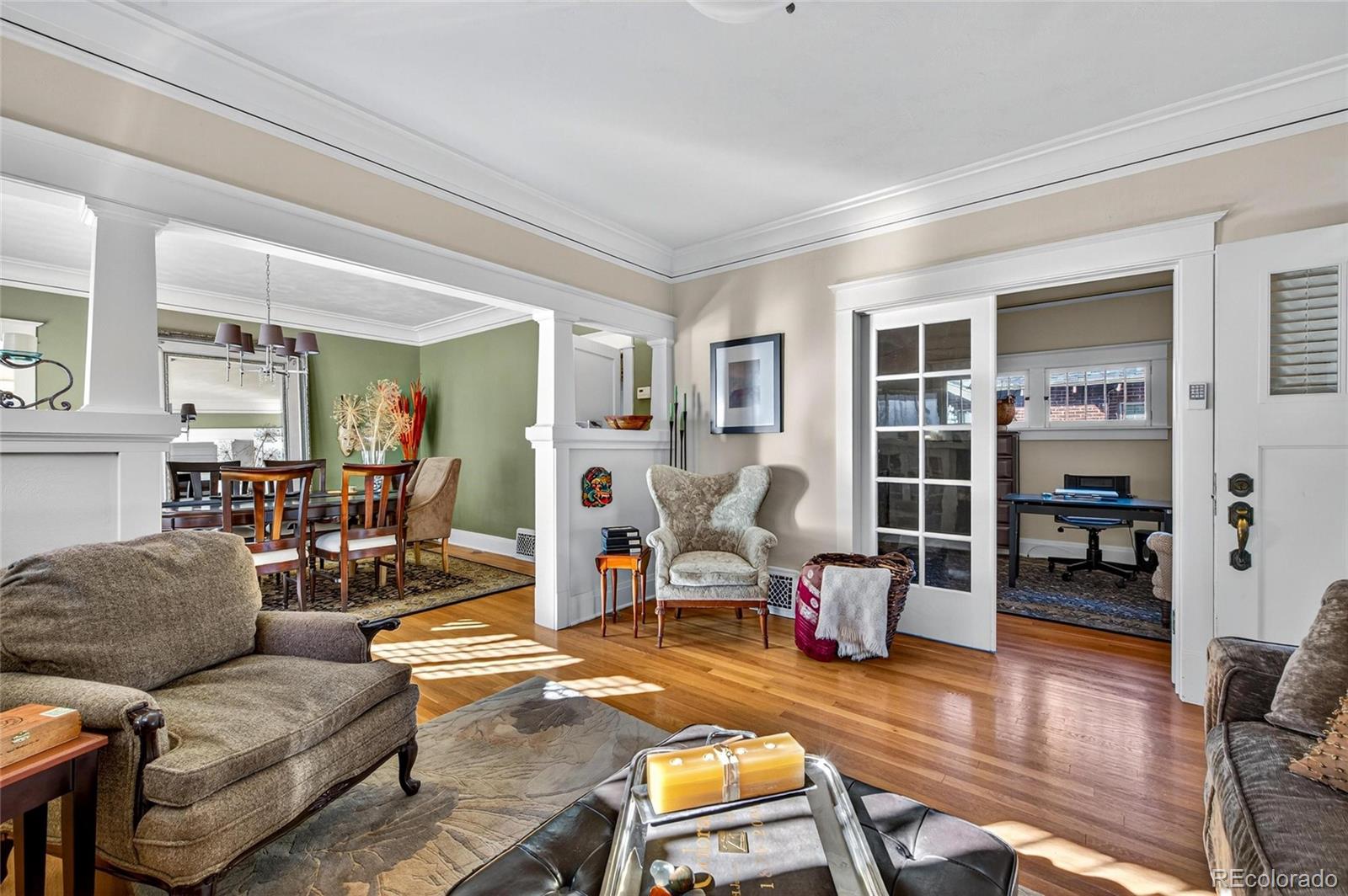 607 Madison Street Denver, CO 80206 - Photo 5 of 31 a living room with furniture and view of kitchen