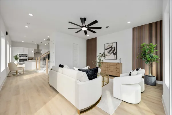 a living room with furniture and a table