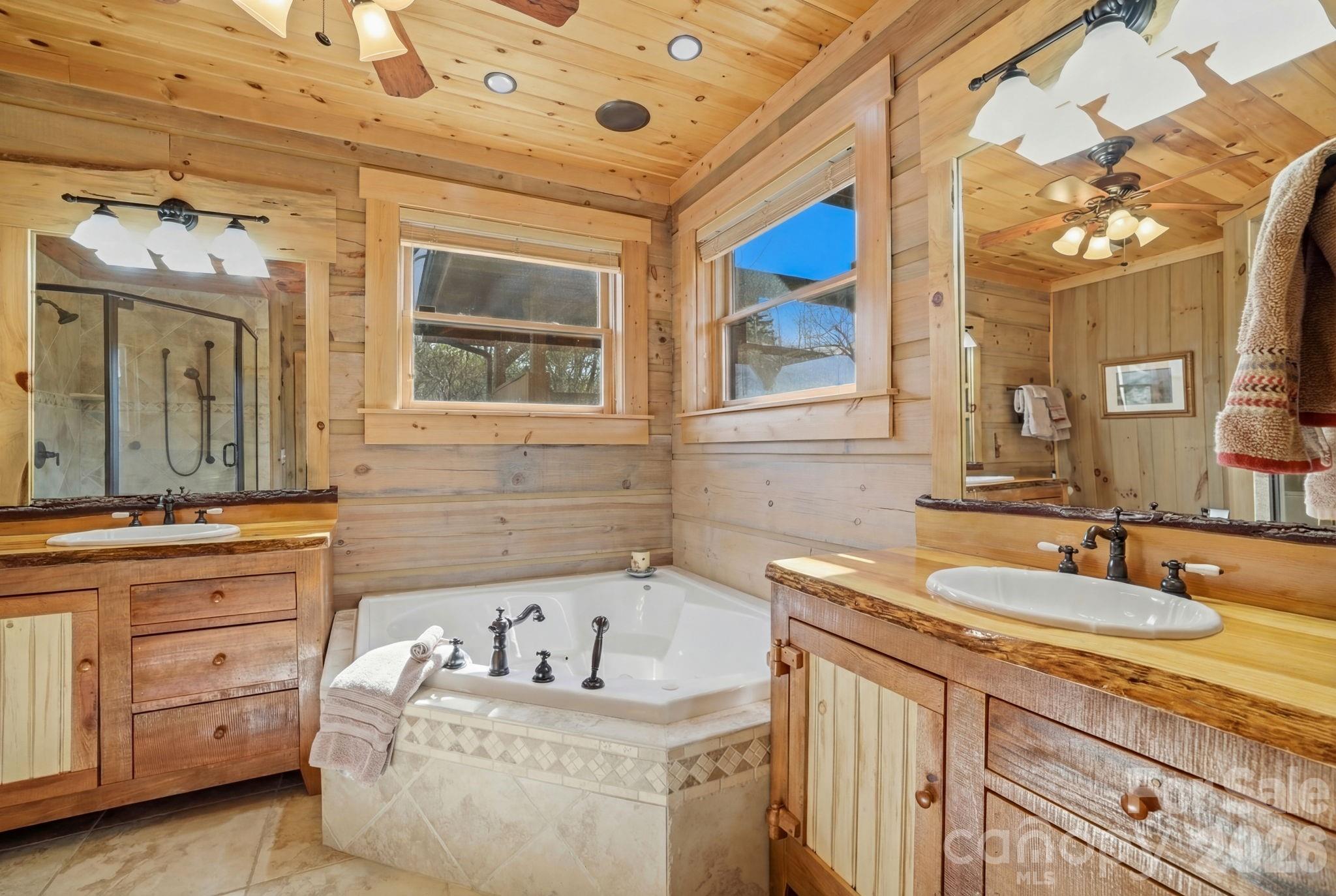 2150 Shell Stand Road Almond, NC 28702 - Photo 22 of 42 a bathroom with a sink and a mirror