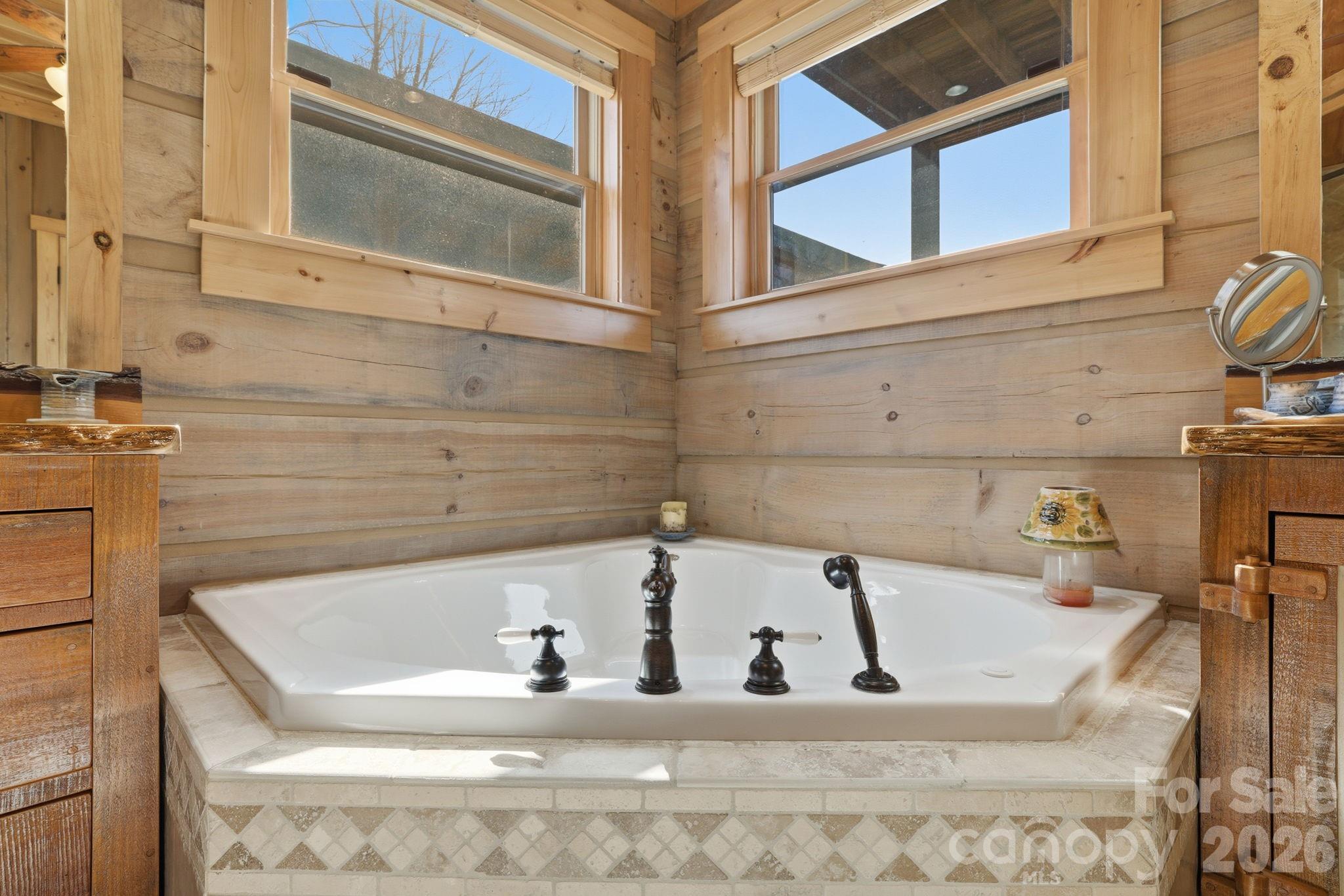 2150 Shell Stand Road Almond, NC 28702 - Photo 23 of 42 a bath tub sitting in front of a bathroom