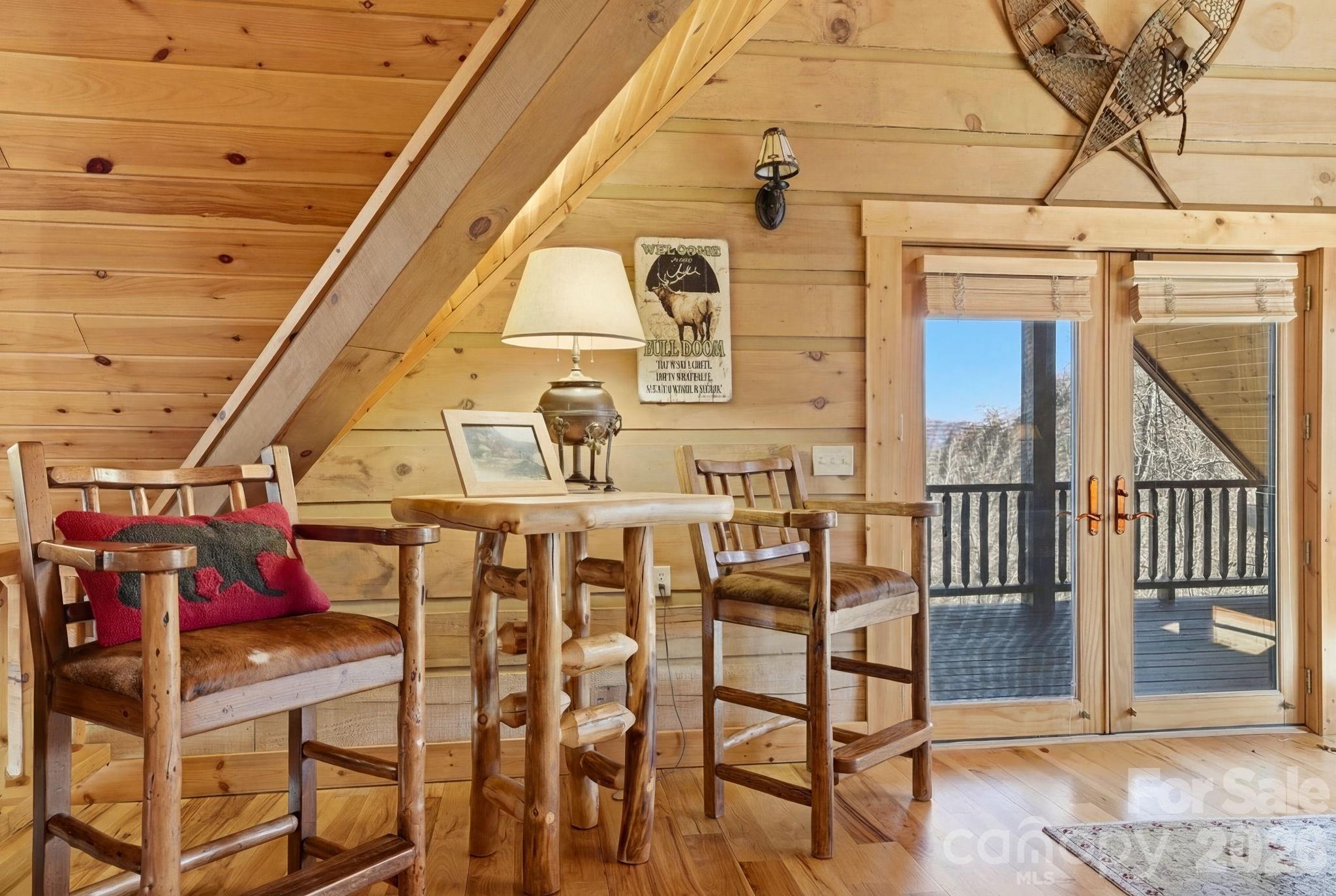 2150 Shell Stand Road Almond, NC 28702 - Photo 26 of 42 a view of a chairs in the balcony