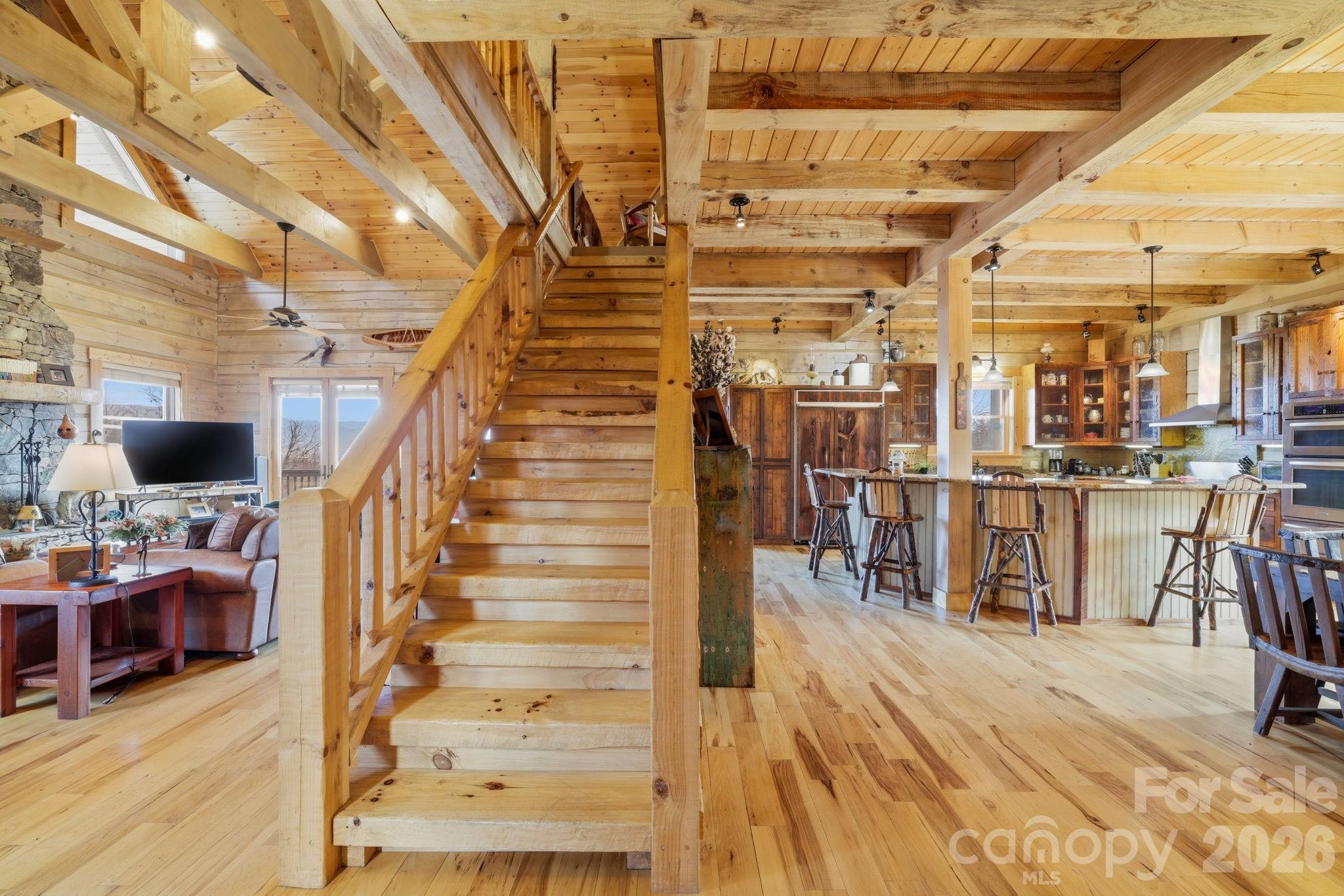 2150 Shell Stand Road Almond, NC 28702 - Photo 7 of 42 a view of entryway and hall with wooden floor
