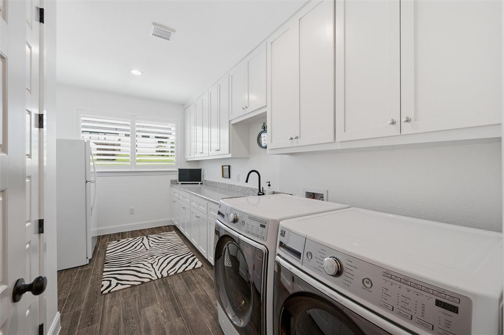 318 Arapahoe Ridge Weatherford, TX 76087 - Photo 25 of 40 Huge laundry with sink and room for fridge