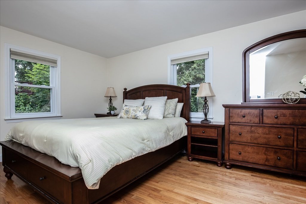 22 Lantern Lane Burlington, MA 01803 - Photo 27 of 34 a bedroom with a bed and a window