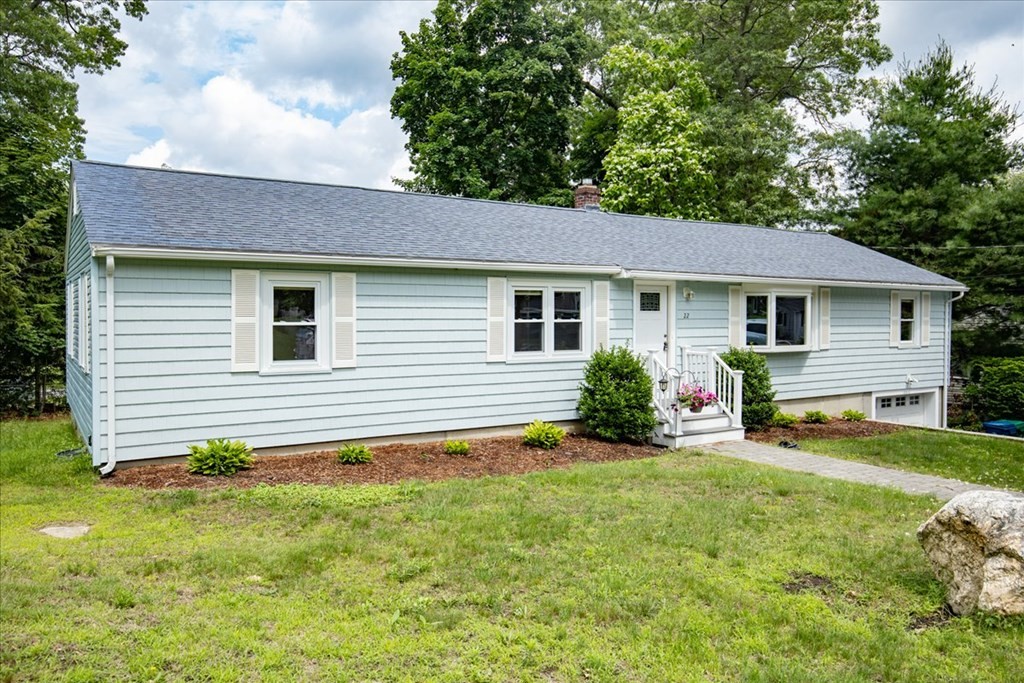 22 Lantern Lane Burlington, MA 01803 - Photo 3 of 34 a view of a house with a backyard and a garden