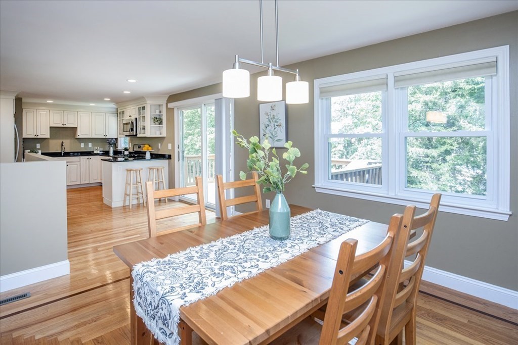 22 Lantern Lane Burlington, MA 01803 - Photo 7 of 34 a view of a dining room with furniture window and wooden floor