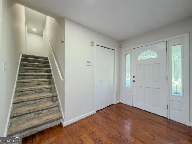 a view of an entryway with stairs