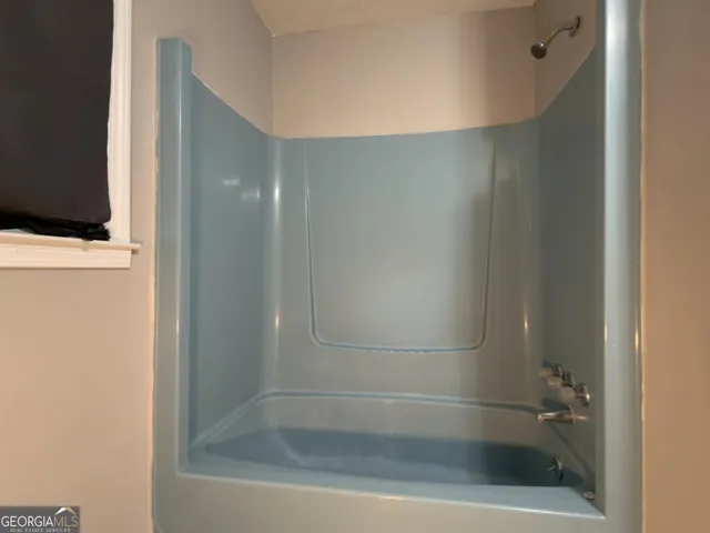 a bathroom with a bathtub