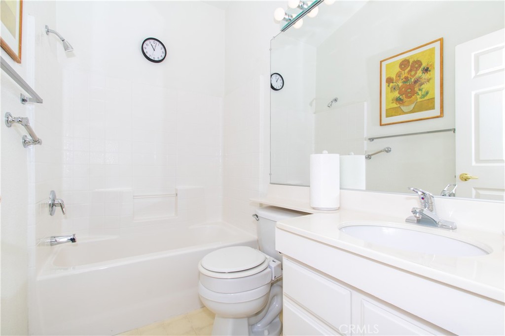 4742 Avenida La Mirada Joshua Tree, CA 92252 - Photo 22 of 45 a bathroom with a sink a toilet and shower