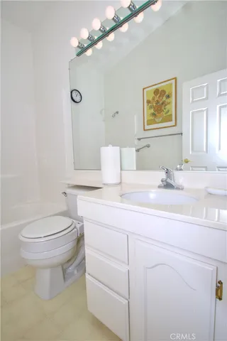 a bed room with a bed and a window