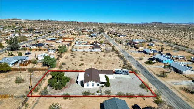 an aerial view of residential houses and city view