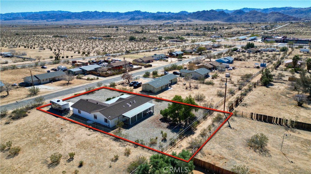 4742 Avenida La Mirada Joshua Tree, CA 92252 - Photo 40 of 45 an aerial view of residential houses and city view