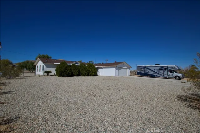 a view of a street with a building in the background