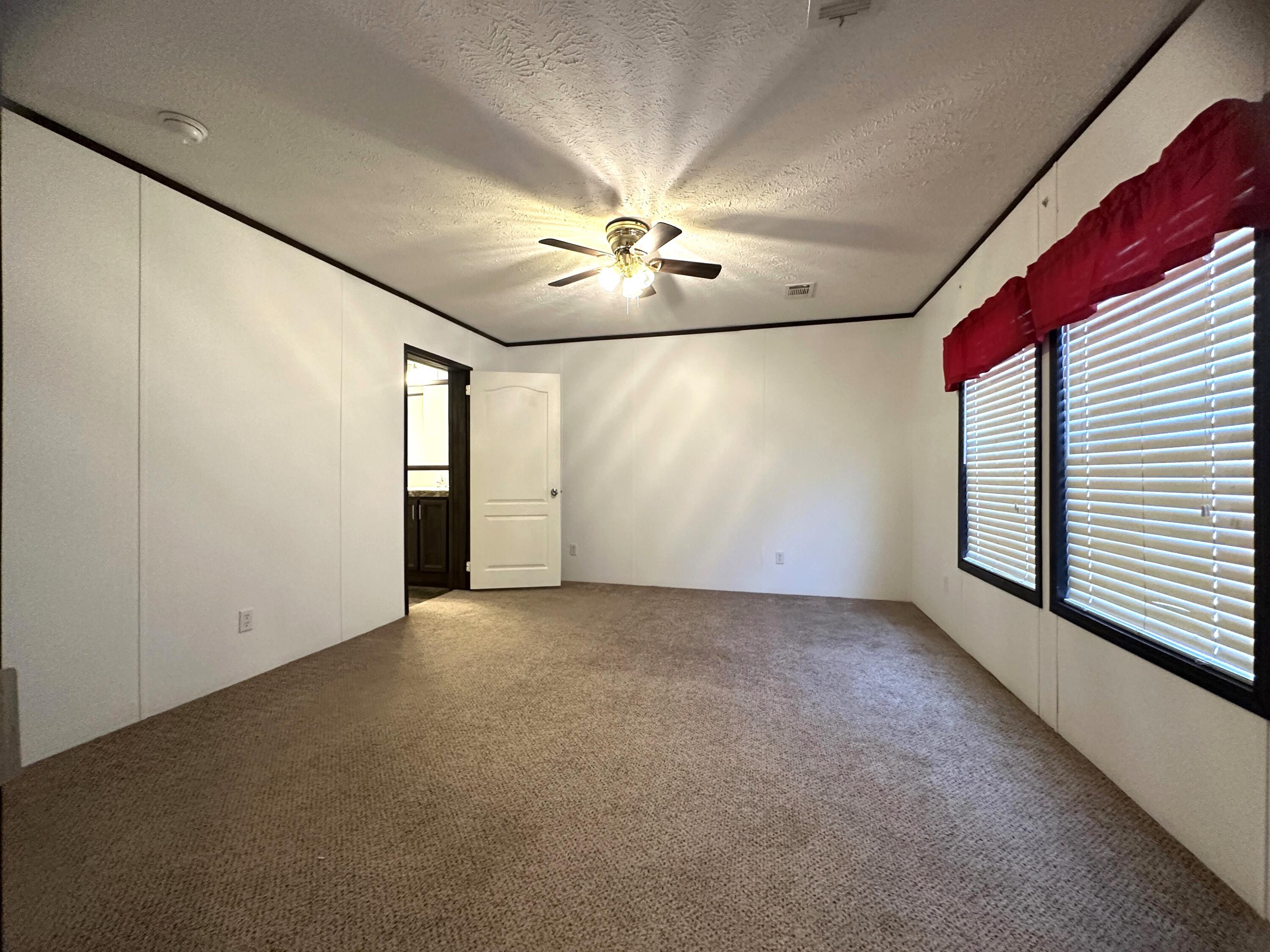 8550 Noah Hurst Road Navarre, FL 32566 - Photo 11 of 31 10. Master Bedroom