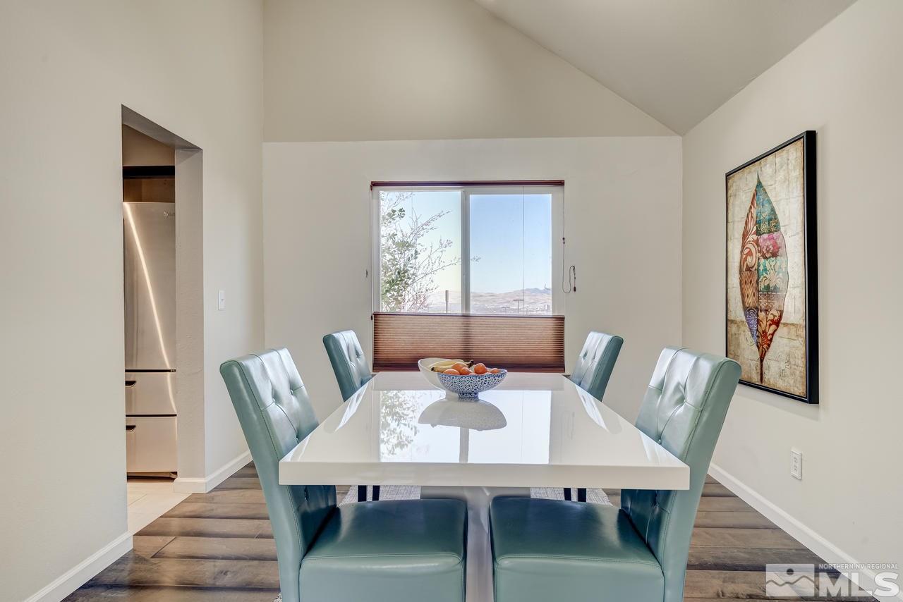 3812 Bexley Square Reno, NV 89503 - Photo 5 of 16 a view of a dining room with furniture window and wooden floor