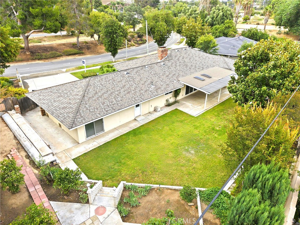 2145 Fairview Avenue Riverside, CA 92506 - Photo 32 of 35 a view of a swimming pool with a yard