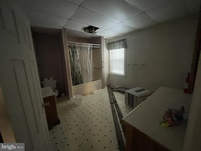 a bathroom with a sink and a tub