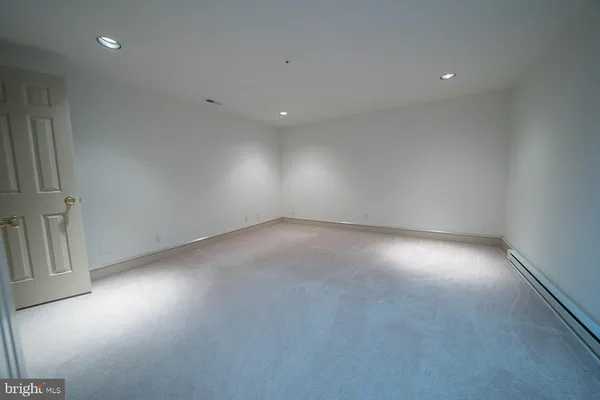 a view of livingroom with hardwood floor and a flat screen tv