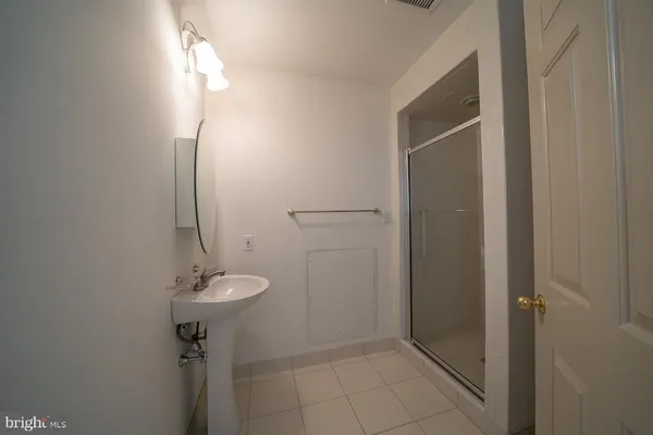 a view of staircase with rug