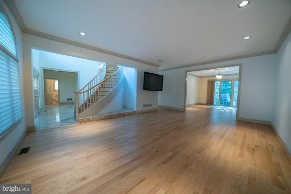 a view of entryway with wooden floor