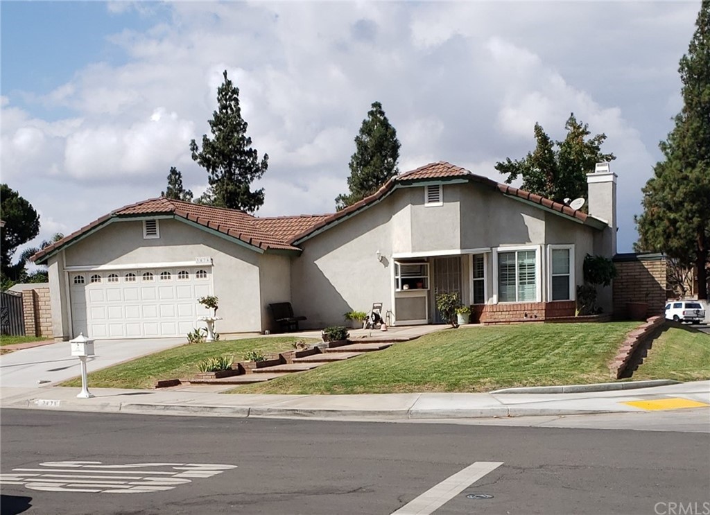 3474 Yankee Circle Riverside, CA 92503 - Photo 1 of 1 a front view of a house with a yard