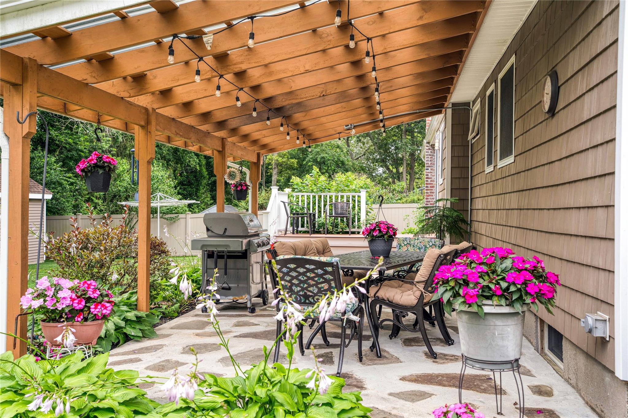 7 Russell Road Hampton Bays, NY 11946 - Photo 19 of 31 View of patio / terrace with outdoor dining area and a pergola