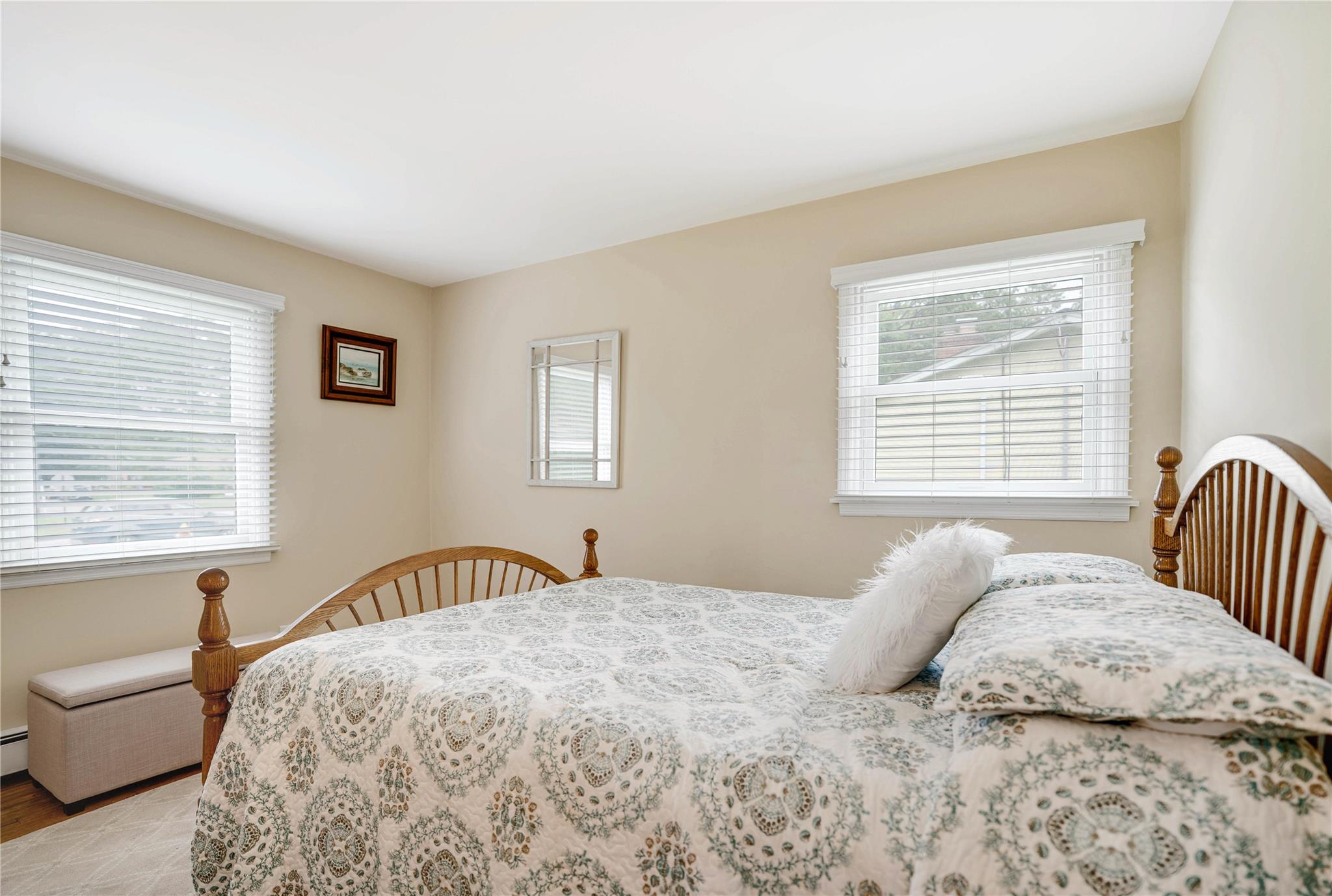 7 Russell Road Hampton Bays, NY 11946 - Photo 6 of 31 Bedroom featuring light wood finished floors