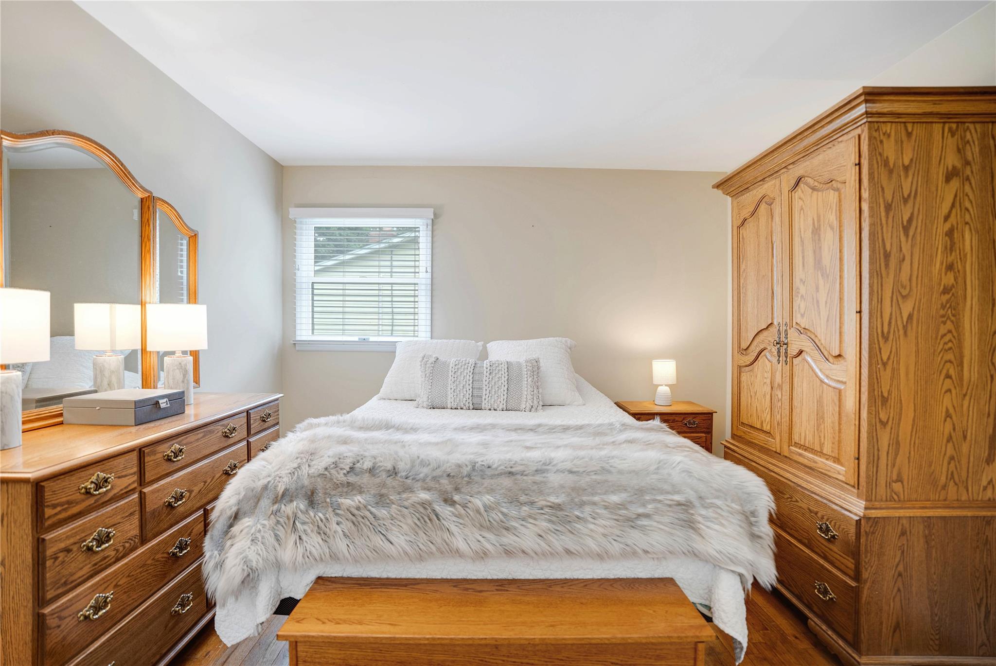 7 Russell Road Hampton Bays, NY 11946 - Photo 10 of 31 Bedroom featuring dark wood-style floors