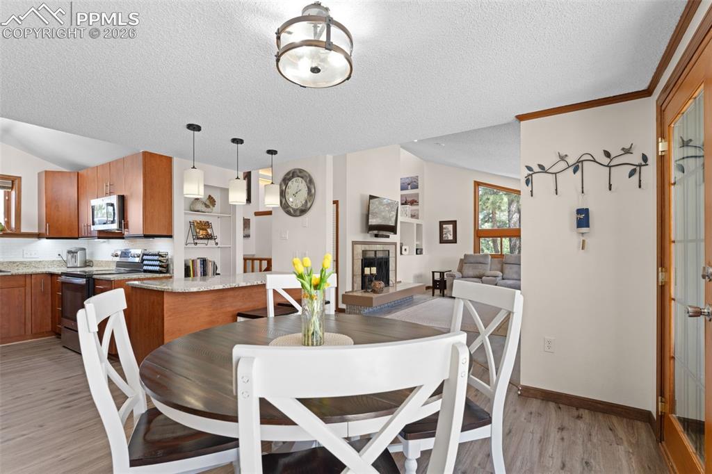 1851 Buttercup Road Elizabeth, CO 80107 - Photo 15 of 47 a dining room with furniture and window