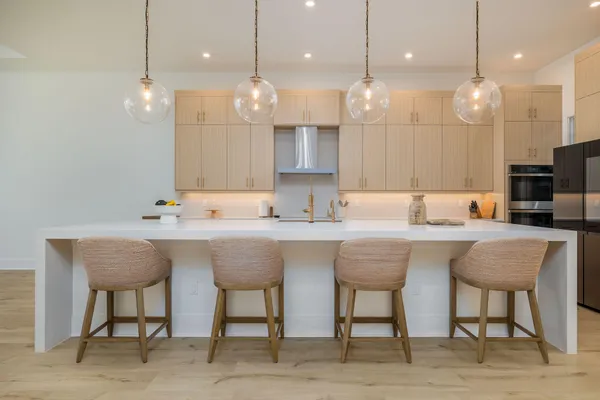 a view of a dining room with furniture and window