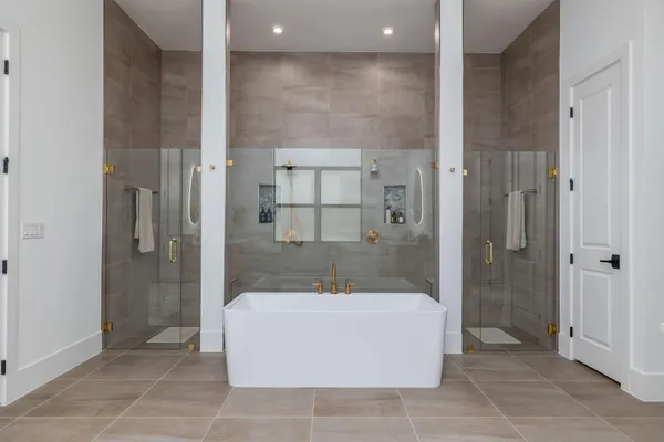 a front view of house with yard and trees