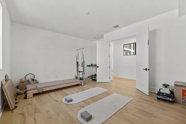 a view of living room with furniture and a flat screen tv