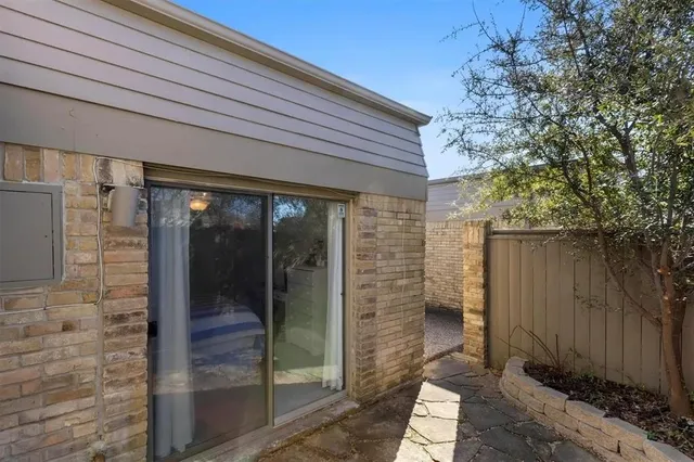 a bathroom with a shower and toilet