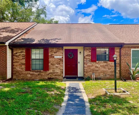 a front view of house with yard
