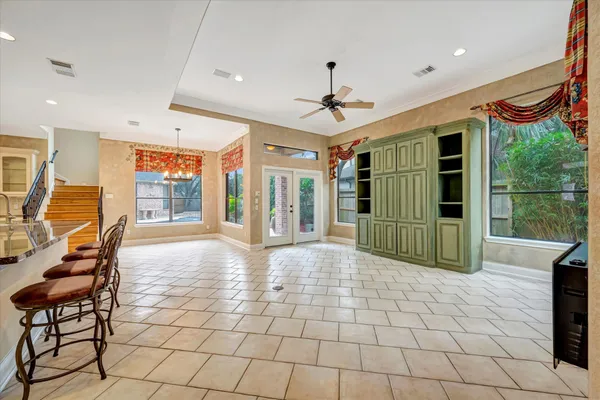 a view of a livingroom with furniture and a flat screen tv