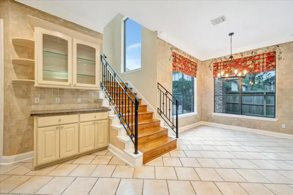 a view of a hallway with windows