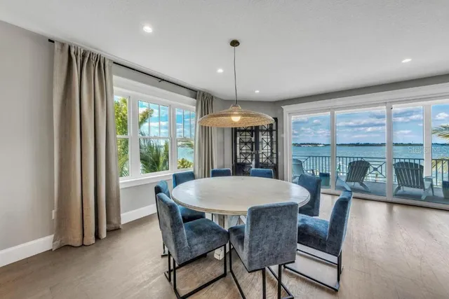 a view of a livingroom with furniture and window