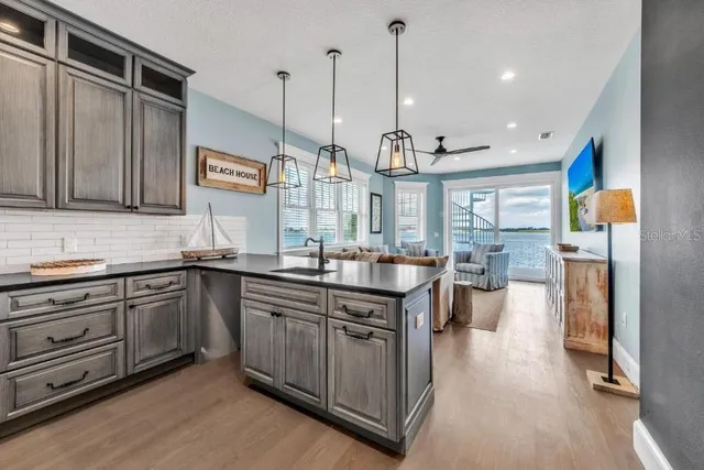 a view of entryway with wooden floor and stairs