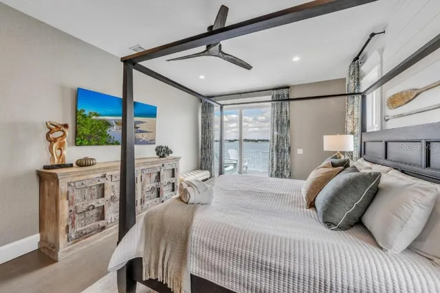 a spacious bathroom with a bathtub shower and windows
