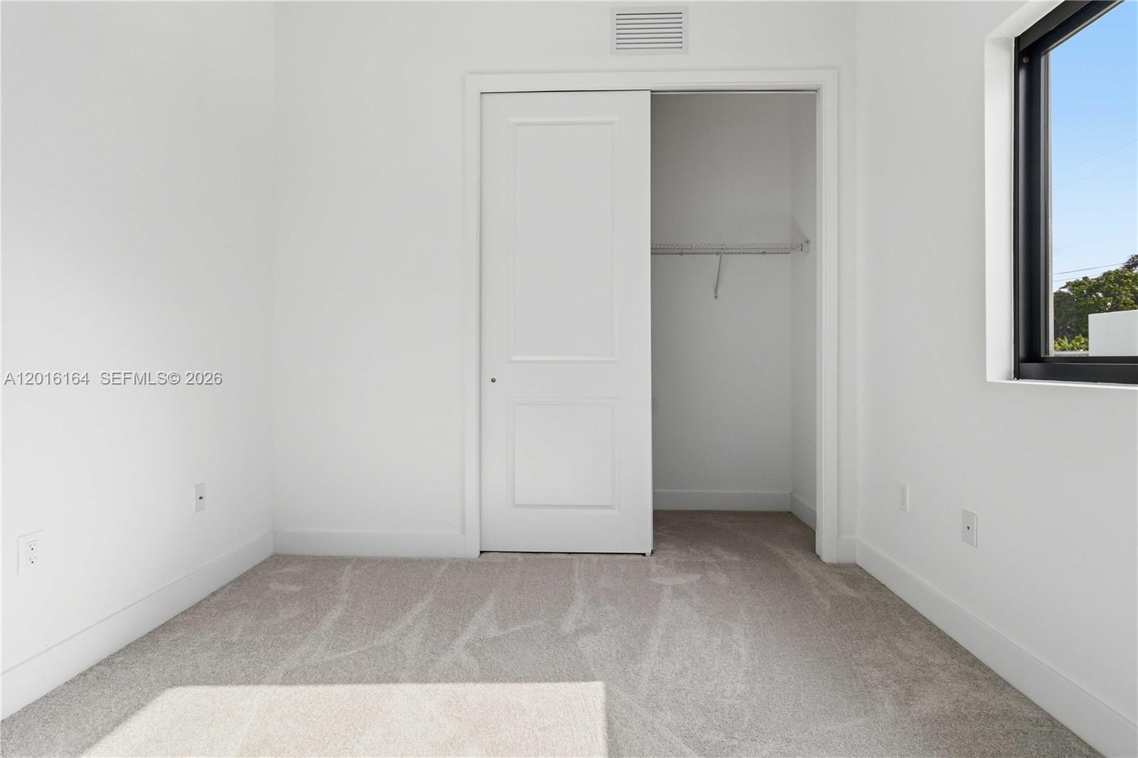 18901 Southwest 316th Street Homestead, FL 33030 - Photo 18 of 33 a view of an empty room