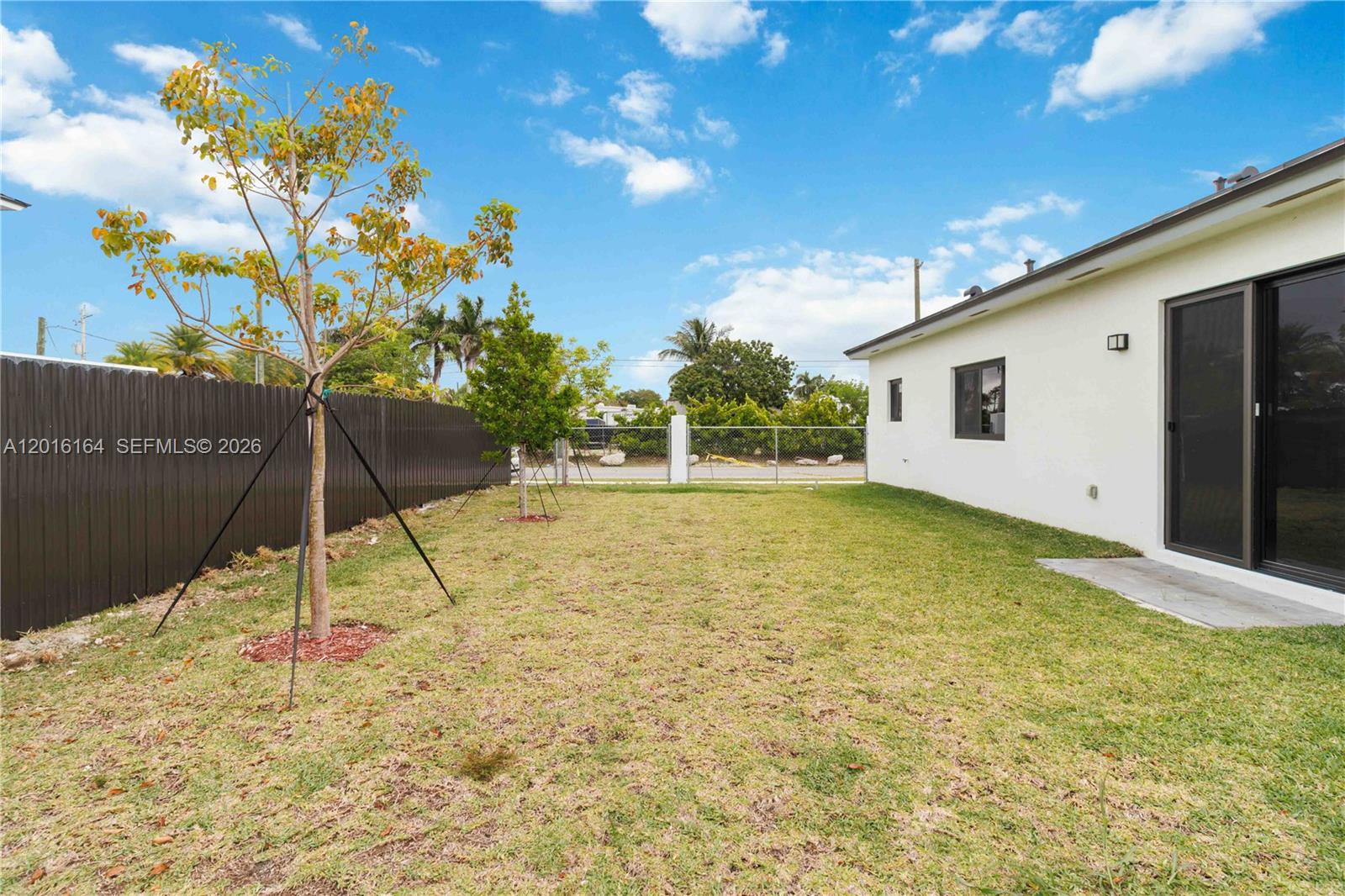18901 Southwest 316th Street Homestead, FL 33030 - Photo 32 of 33 a view of a backyard