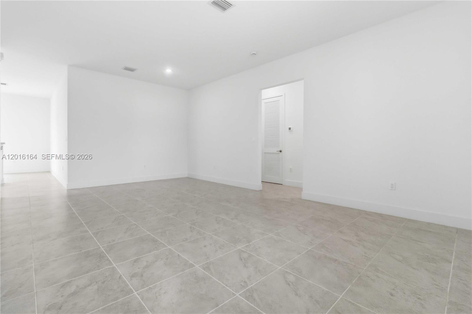 18901 Southwest 316th Street Homestead, FL 33030 - Photo 8 of 33 a view of empty room