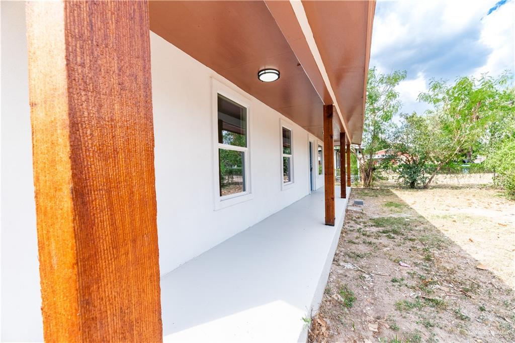 214 South 28th Street McAllen, TX 78501 - Photo 8 of 9 a view of a porch with seating space