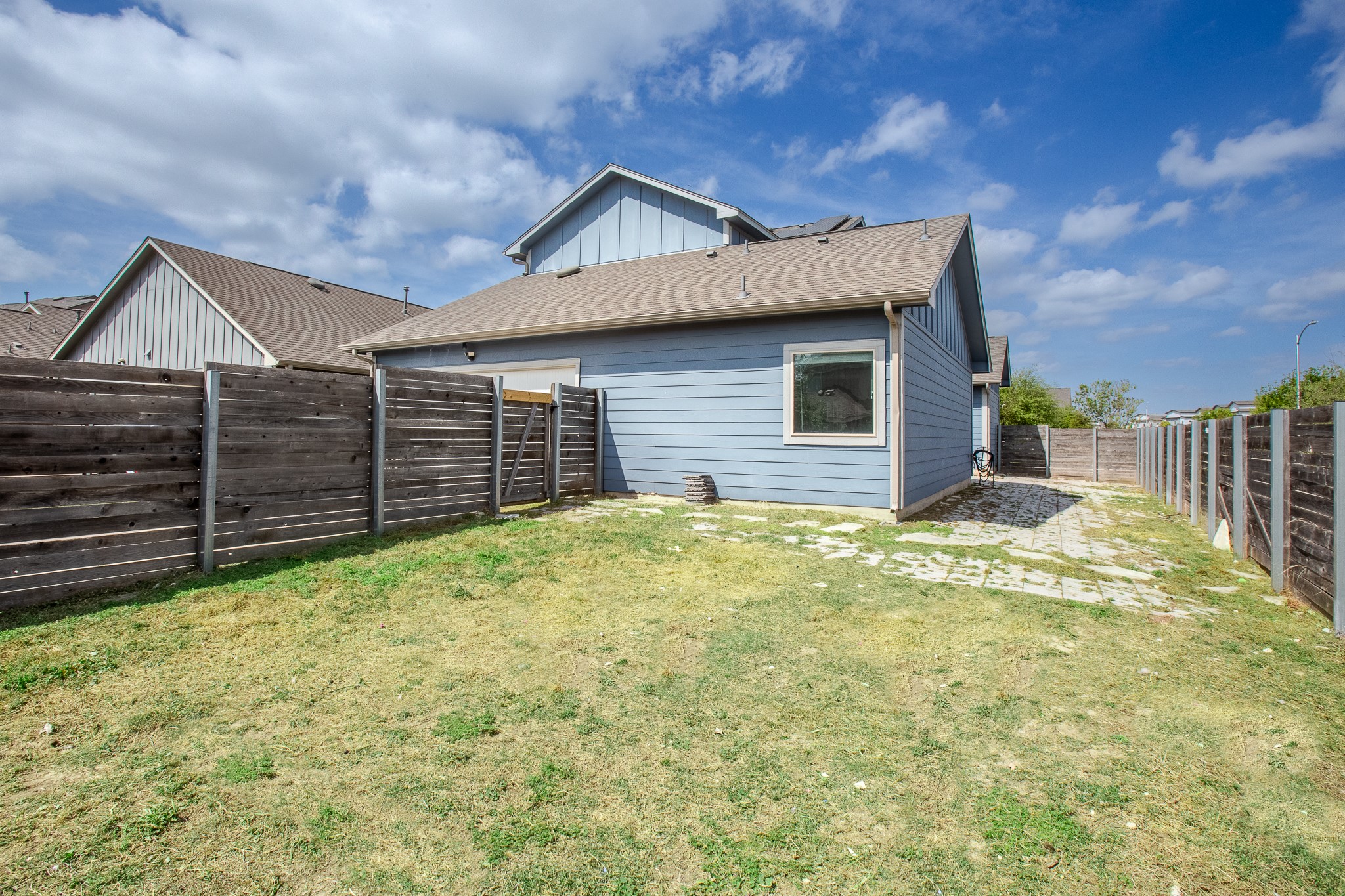 8709 Slater Drive Austin, TX 78747 - Photo 35 of 36 a front view of a house with a yard