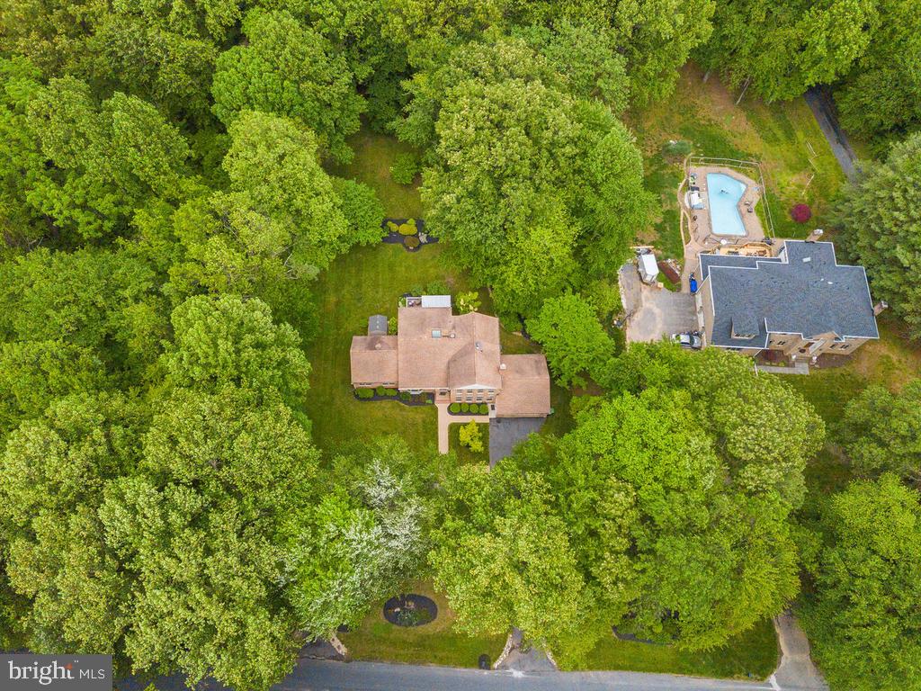 600 Bryants Nursery Road Silver Spring, MD 20905 - Photo 53 of 60 an aerial view of a house with a yard basket ball court and outdoor seating