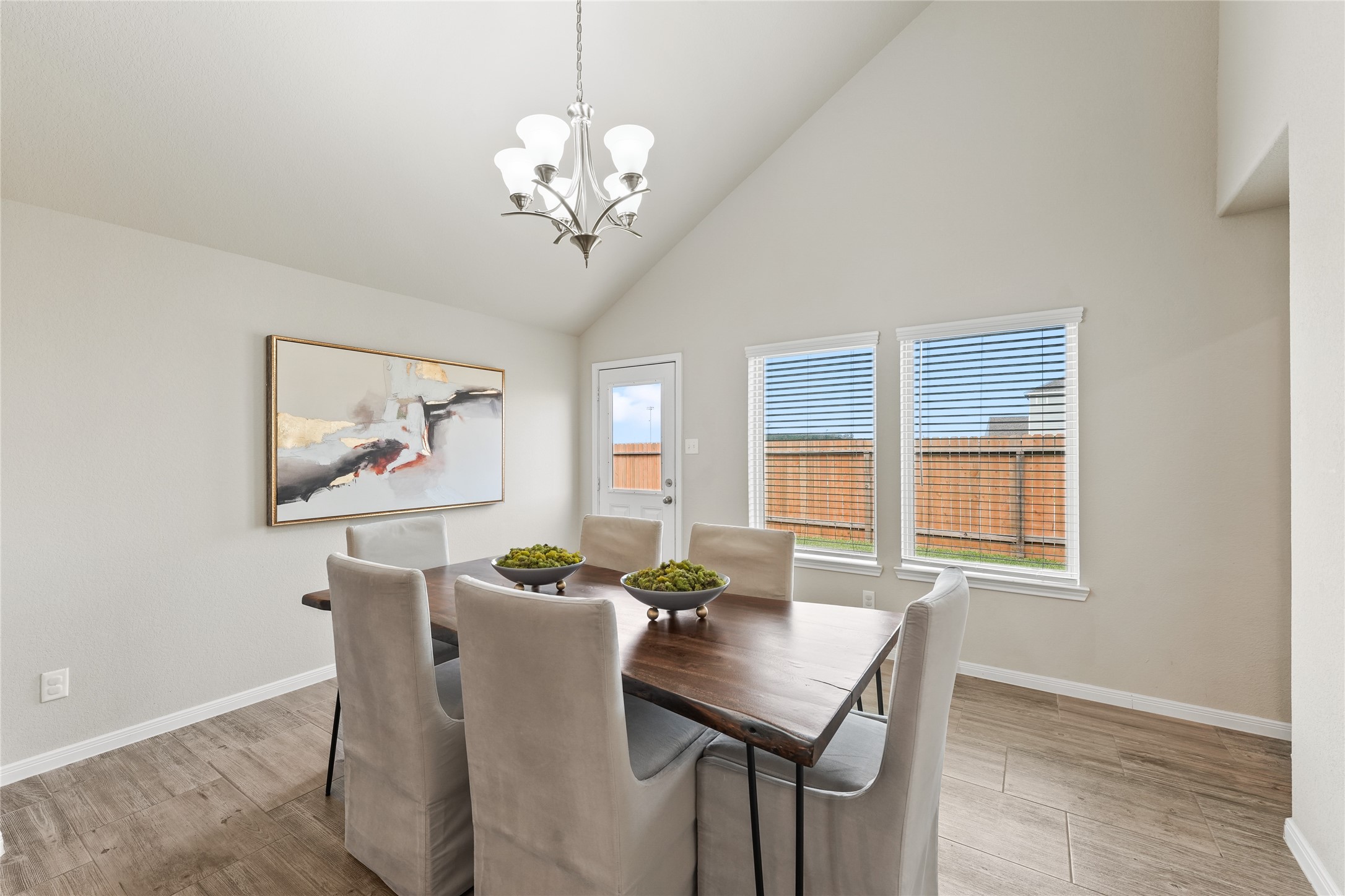 7911 Tuscan Cypress Drive Cypress, TX 77433 - Photo 12 of 27 a view of a dining room with furniture window and wooden floor