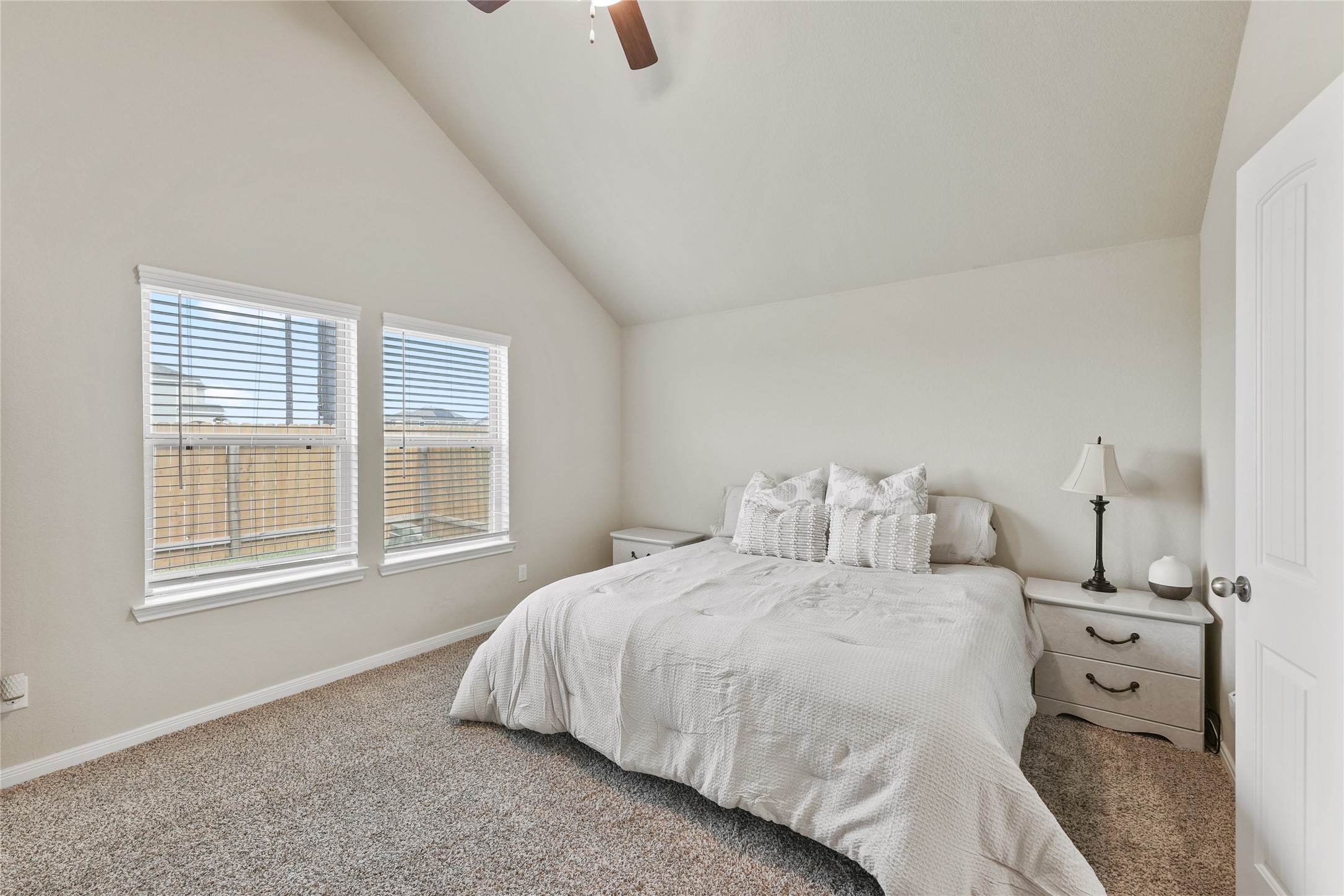 7911 Tuscan Cypress Drive Cypress, TX 77433 - Photo 13 of 27 a bedroom with a bed and a window