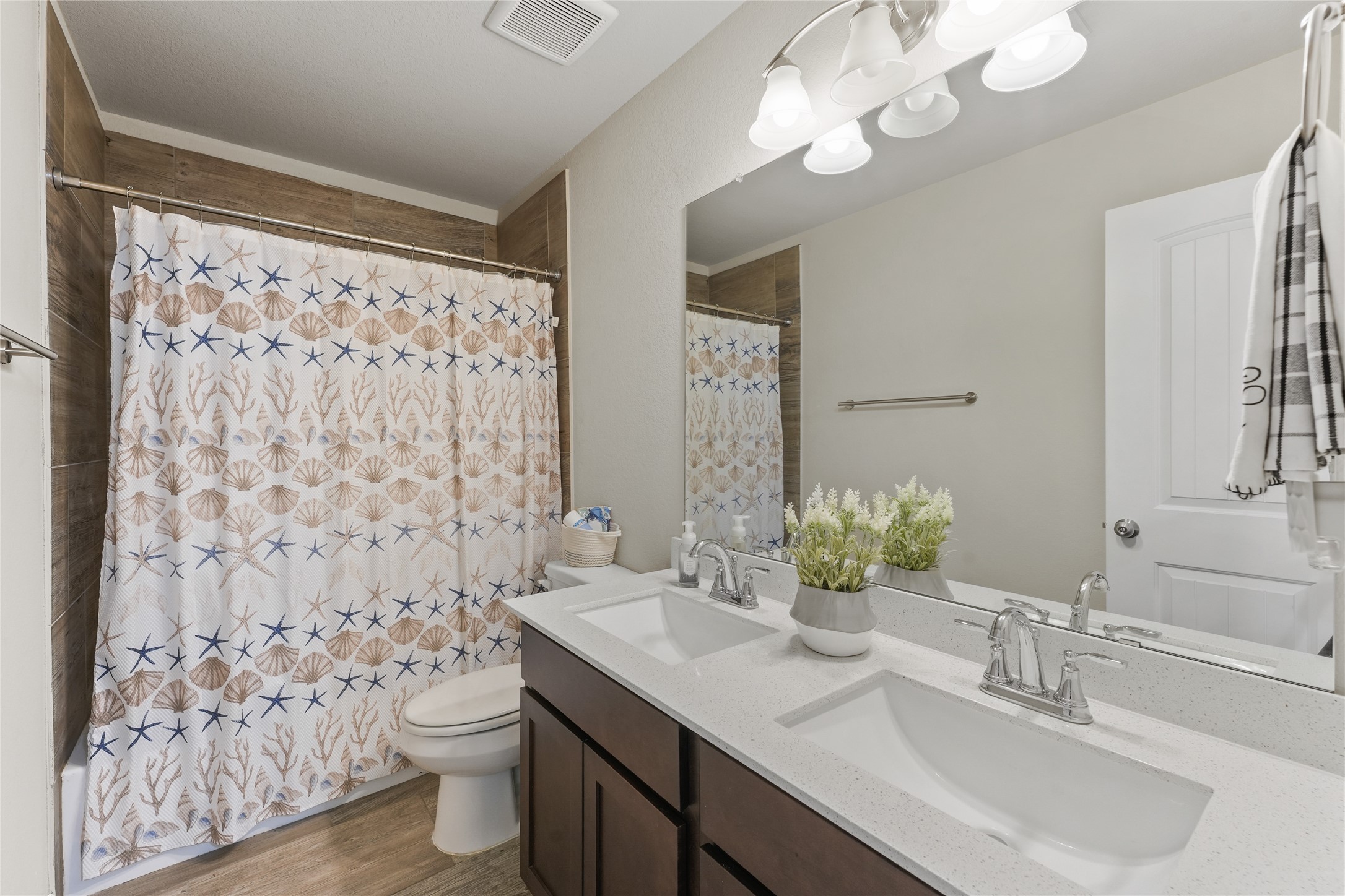 7911 Tuscan Cypress Drive Cypress, TX 77433 - Photo 17 of 27 a bathroom with a sink toilet and shower